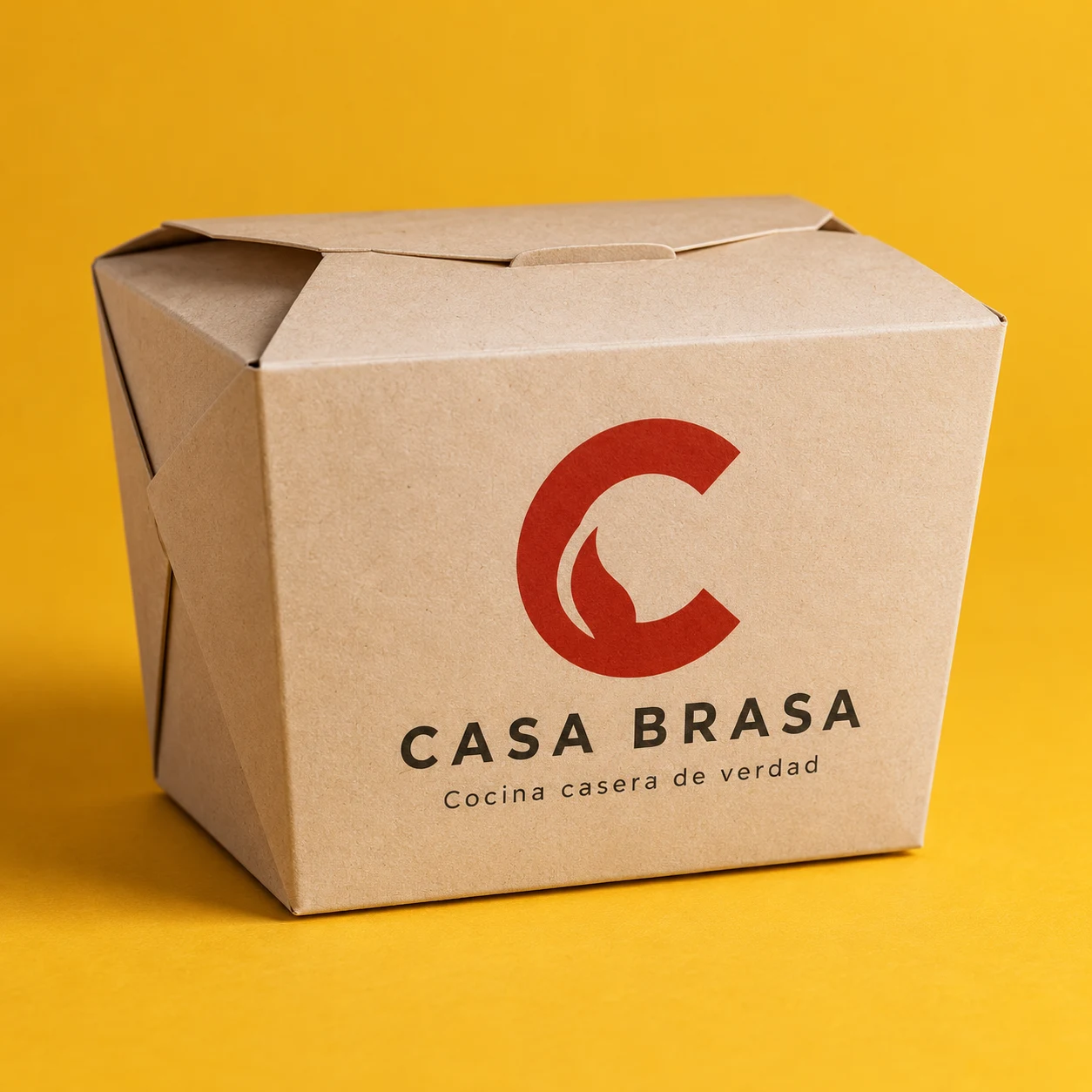 Cartón de recogida de marca Spice House en fondo de azafrán
